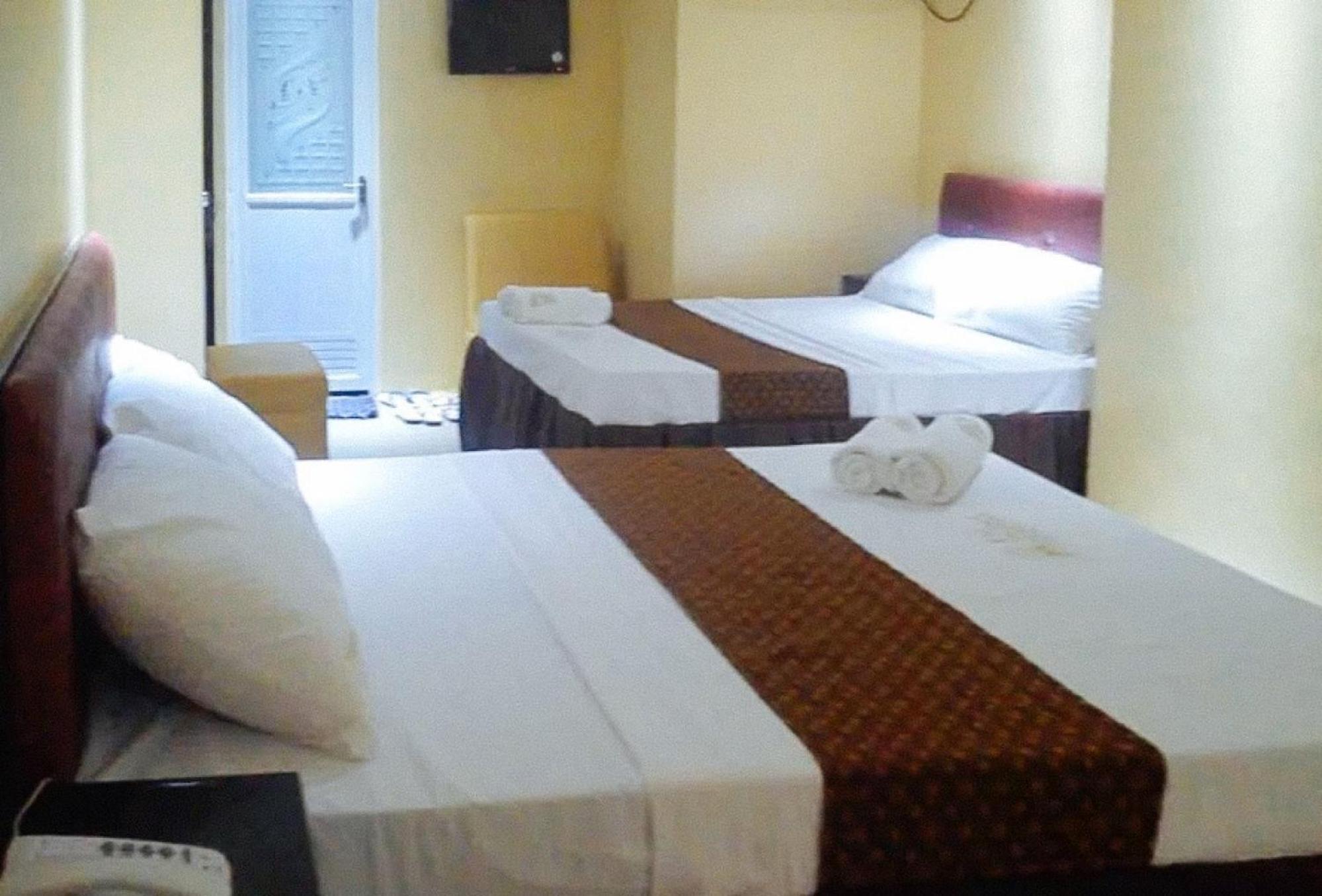 Reddoorz Plus @ Taj Hotel Tuguegarao ภายนอก รูปภาพ