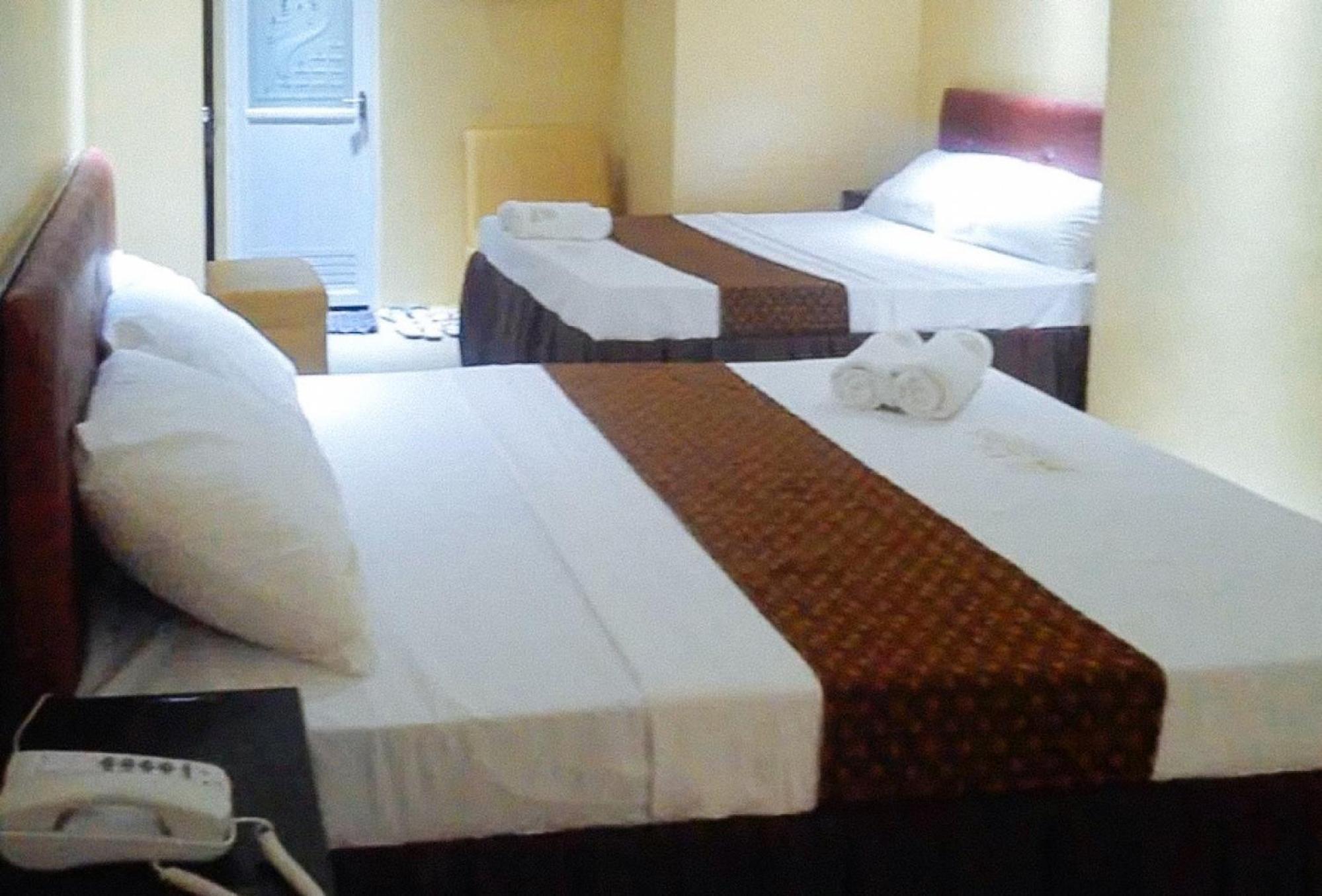 Reddoorz Plus @ Taj Hotel Tuguegarao ภายนอก รูปภาพ